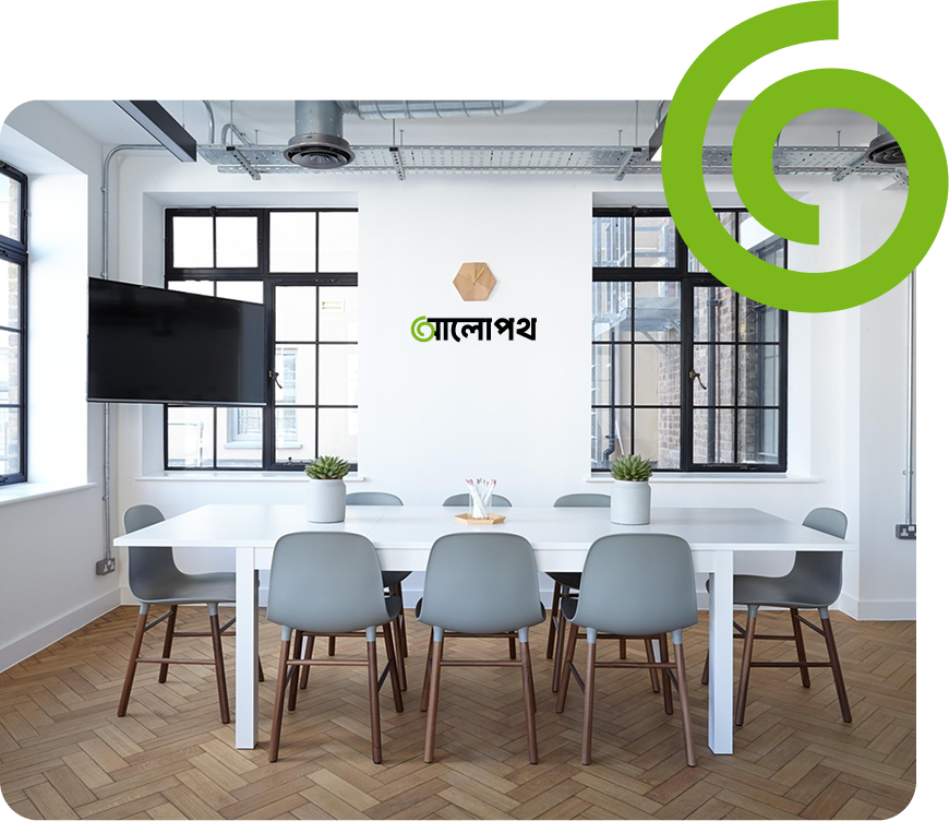 Bright modern workspace with a conference table and ALOPOTH branding on the wall